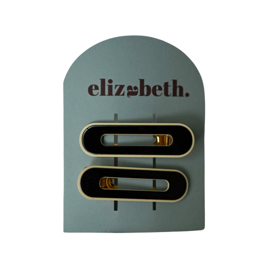 black & cream outline hair clips